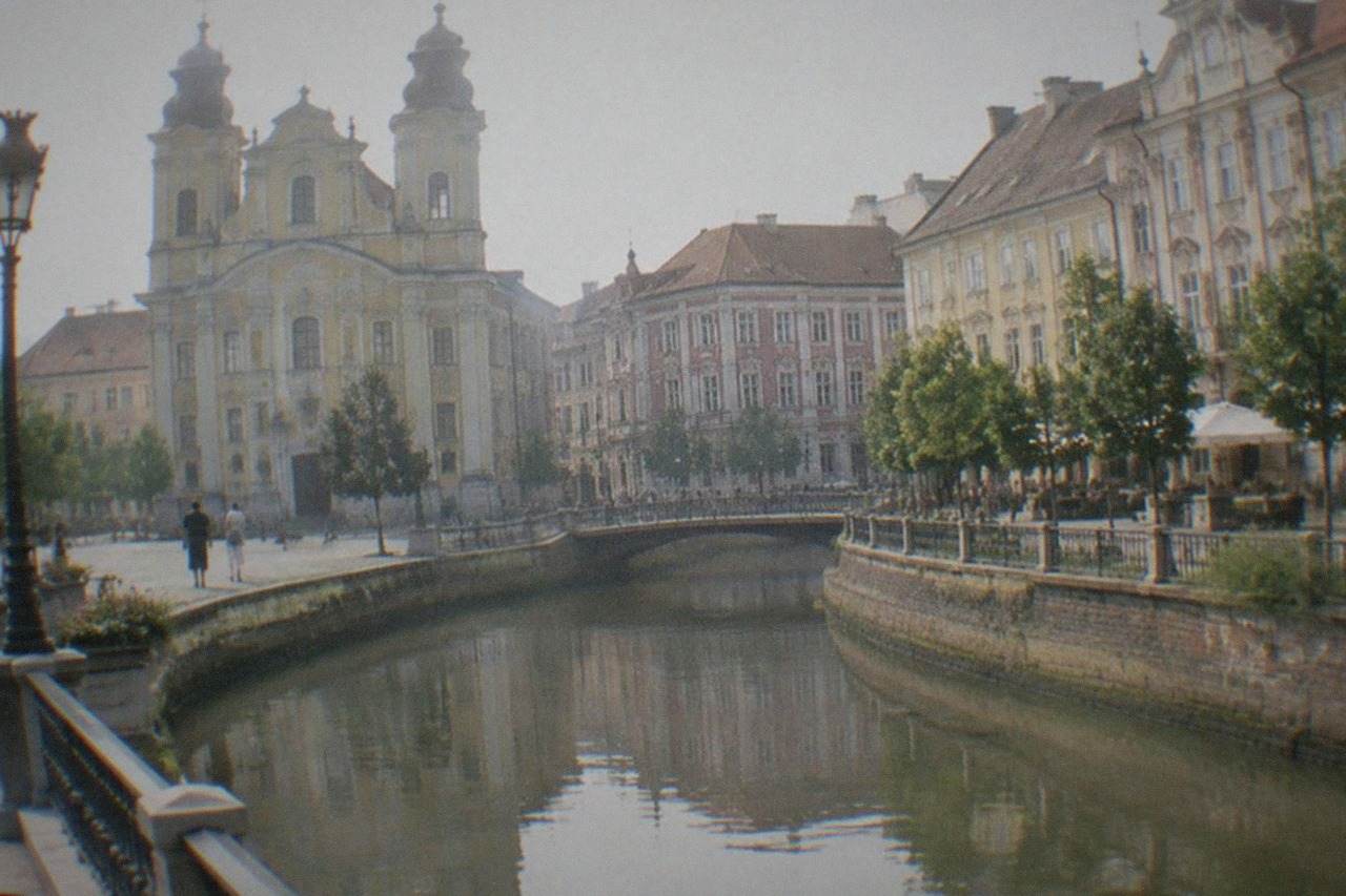 Baroque buildings and pastel facades around a historic square in Timisoara
