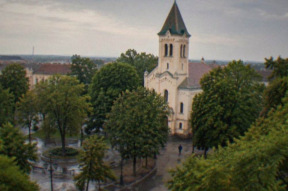 The Millennium Church in Iosefin seen from its tree-lined square