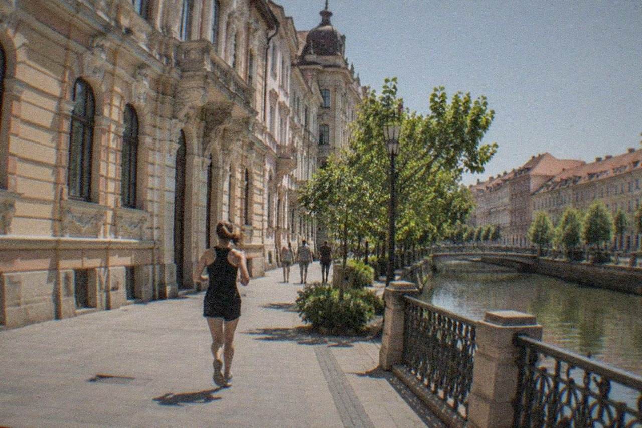 Ornate historic building facade with sculpted decoration on a sunny street in Timisoara