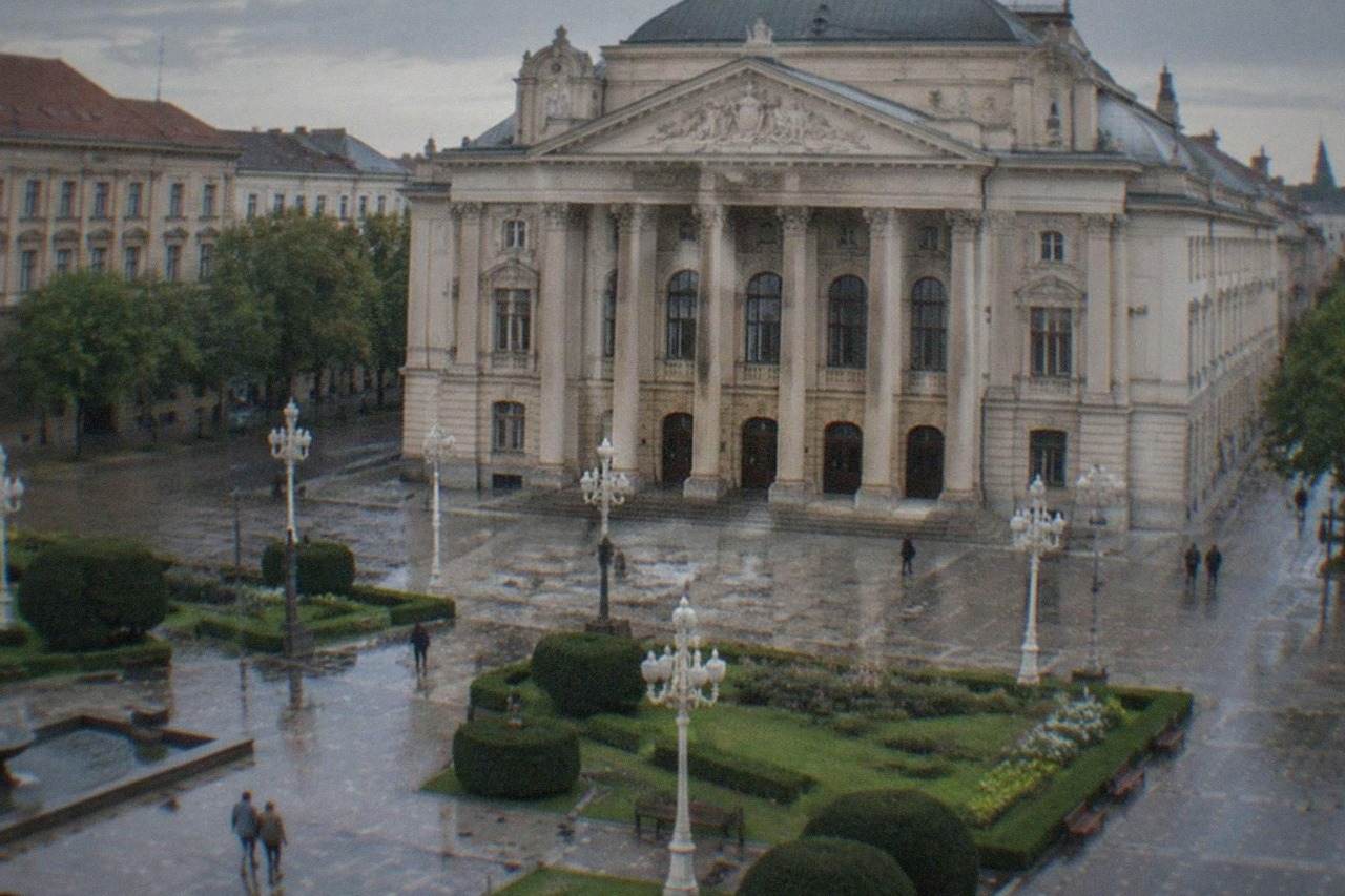 The ornate facade of the Romanian National Opera building in Timisoara seen from the square