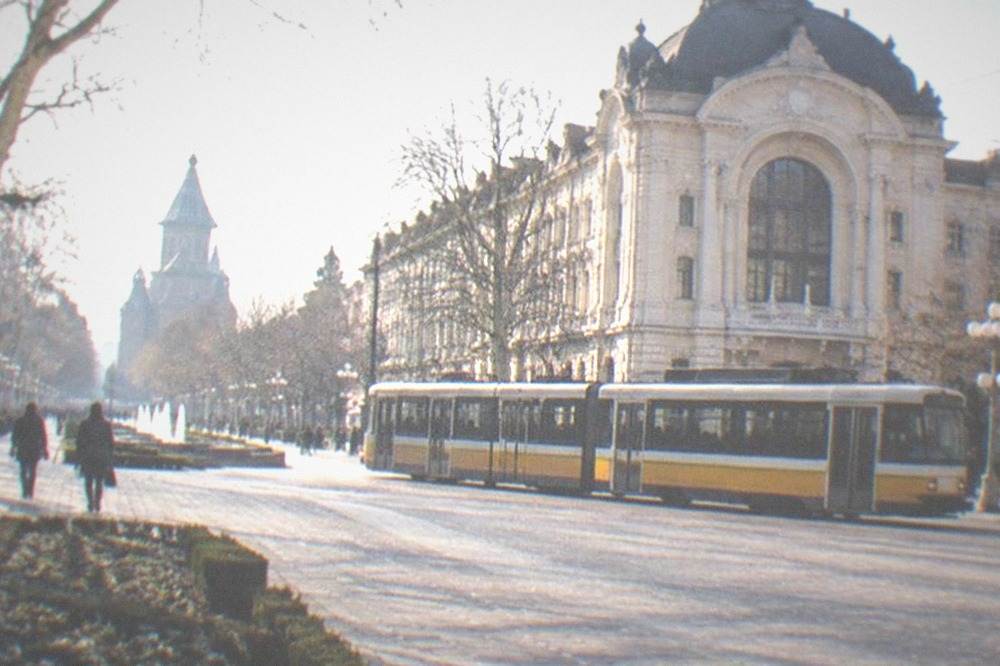 A tram crossing Piata Victoriei in front of the Opera in Timisoara