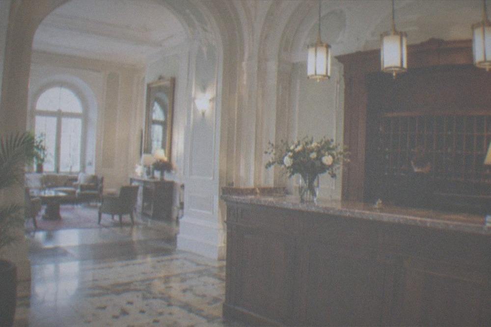 A hotel reception desk in a restored historic building in Timisoara