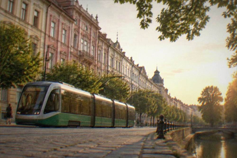 A modern tram passing green trees on a street in Timisoara